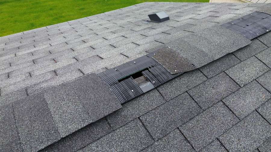 Damaged roof vent and shingle condition found during home inspection in Flathead Valley Montana